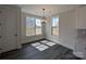 Bright breakfast nook featuring a modern chandelier and natural light, adjacent to the kitchen at 279 Luray Way # 448, Rock Hill, SC 29730