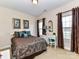 Comfortable bedroom with natural light and decorative window treatments at 2802 Santiago Cir, Monroe, NC 28110