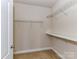 Walk-in closet with wire shelving and carpeted floor at 2802 Santiago Cir, Monroe, NC 28110