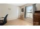 Inviting bedroom featuring a comfortable desk, ample natural light, and neutral wall paint at 3080 Sims Rd, Rock Hill, SC 29730