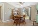 Cozy dining room featuring wood floors, a window, and a classic wooden dining set at 3080 Sims Rd, Rock Hill, SC 29730