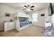 Comfortable bedroom with a bunk bed, ceiling fan, and neutral carpet perfect for children at 317 Praline Way, Fort Mill, SC 29715