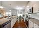 Modern kitchen with stainless steel appliances, granite countertops, and an open design at 317 Praline Way, Fort Mill, SC 29715