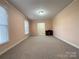 Comfortable living room with carpeting and two windows that let in plenty of light at 3660 9Th Street Ne Dr, Hickory, NC 28601