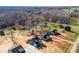 Aerial view of several homes with a backdrop of trees and undeveloped land at 4005 Miller Rd, Salisbury, NC 28147