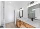 Modern bathroom features a double sink vanity, black fixtures, and sleek mirrors for a stylish look at 4005 Miller Rd, Salisbury, NC 28147