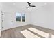 Bright bedroom with ample light, closet and crisp white walls at 4005 Miller Rd, Salisbury, NC 28147