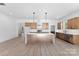 Modern kitchen with stainless appliances, central island and light wood cabinets at 4005 Miller Rd, Salisbury, NC 28147