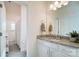 Well-lit bathroom with granite counters and a view to a second bathroom at 4208 Stream Dale Nw Cir, Concord, NC 28027