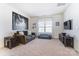 Spacious living room with comfortable seating and a large window for natural light at 4208 Stream Dale Nw Cir, Concord, NC 28027