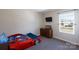 Bedroom featuring a race car bed, mounted TV, and natural light at 446 Brannon Meadows Dr, York, SC 29745