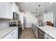 Well-lit kitchen with granite countertops, stainless appliances, and a functional layout for cooking and prep at 446 Brannon Meadows Dr, York, SC 29745