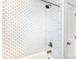 Modern bathroom features white subway tile shower and updated fixtures at 4717 Doris Ave, Charlotte, NC 28205