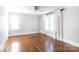 Bright bedroom with hardwood floors, ceiling fan, and lots of light at 4717 Doris Ave, Charlotte, NC 28205