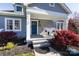 Inviting covered front porch with rocking chairs, perfect for relaxing outdoors at 4717 Doris Ave, Charlotte, NC 28205