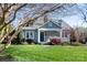 Charming craftsman home featuring a welcoming front porch and beautifully landscaped yard at 4717 Doris Ave, Charlotte, NC 28205