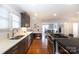 Beautiful kitchen featuring granite countertops, stainless appliances and bright lighting at 4717 Doris Ave, Charlotte, NC 28205