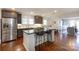 Open kitchen layout with granite countertops and stainless steel appliances at 4717 Doris Ave, Charlotte, NC 28205