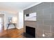 Stylish living room featuring a modern fireplace and sleek decor at 4717 Doris Ave, Charlotte, NC 28205