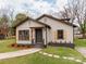 Exterior angle view of a single-Gathering home with a well-maintained front yard at 507 N Oakland St, Gastonia, NC 28052