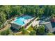 Aerial view of the sparkling community pool surrounded by lush greenery and seating at 5136 Samoa Ridge Dr, Lancaster, SC 29720