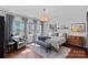 Serene bedroom with hardwood floors, neutral tones, large windows and an inviting reading nook at 5136 Samoa Ridge Dr, Lancaster, SC 29720