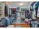 Spacious walk-in closet with custom organization systems, providing ample storage for clothes and accessories at 5136 Samoa Ridge Dr, Lancaster, SC 29720