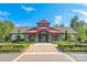 Beautiful community clubhouse with a stone exterior and manicured landscaping at 5136 Samoa Ridge Dr, Lancaster, SC 29720