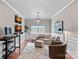 Bright living room with neutral walls, hardwood floors, a window, and a cozy seating area at 5136 Samoa Ridge Dr, Lancaster, SC 29720