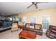 Relaxing living room features comfortable leather seating, neutral decor, and an open view to the kitchen at 625 Circle Trace Rd, Monroe, NC 28110