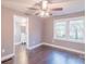 Bedroom boasts hardwood floors, a ceiling fan, and natural light at 6282 Richburg Rd, Great Falls, SC 29055