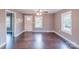 Inviting living room boasts gleaming wood floors, fresh paint, and natural light at 6282 Richburg Rd, Great Falls, SC 29055