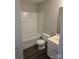 Compact bathroom featuring a tub, toilet, and single sink vanity at 649 Favorwood Dr, Rock Hill, SC 29730