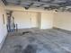 Clean, unfinished garage with concrete floors and garage door openers at 649 Favorwood Dr, Rock Hill, SC 29730