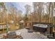 Backyard deck with hot tub, needs repair and decluttering at 9575 Old Concord Rd, China Grove, NC 28023