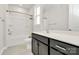 Bathroom with modern vanity, a sink, and a shower-tub combo at 9650 Liberty Hill Dr, Mint Hill, NC 28227