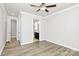 Bedroom with ceiling fan and ensuite bathroom at 9650 Liberty Hill Dr, Mint Hill, NC 28227