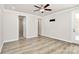 Large bedroom with hardwood floors and ceiling fan at 9650 Liberty Hill Dr, Mint Hill, NC 28227