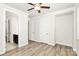 Bedroom with hardwood floors and an ensuite bathroom at 9650 Liberty Hill Dr, Mint Hill, NC 28227