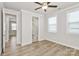 Bedroom with hardwood floors, a ceiling fan and two entries at 9650 Liberty Hill Dr, Mint Hill, NC 28227