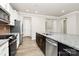 Modern kitchen with stainless steel appliances and granite countertops at 9650 Liberty Hill Dr, Mint Hill, NC 28227