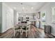 Modern kitchen featuring stainless steel appliances, and eat-in dining area at 117 Cramerton Mills Pkwy, Cramerton, NC 28032