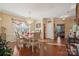 Bright dining area showcasing elegant furniture and natural light at 12502 Bending Branch Rd, Charlotte, NC 28227