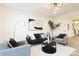 Inviting living room with neutral tones, modern decor, and plenty of natural light at 13024 Suncreek Ter, Charlotte, NC 28214