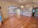 Open living room with hardwood floors, connecting seamlessly to dining areas at 1419 Ridge St, Albemarle, NC 28001