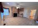 Cozy living room features a fireplace with built-in shelves and tile flooring at 1419 Ridge St, Albemarle, NC 28001