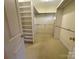 Large walk-in closet with built-in shelving and ample storage space at 1419 Ridge St, Albemarle, NC 28001