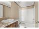 Bathroom featuring a single sink vanity, toilet, and tub/shower at 143 Lakewind Dr, Mooresville, NC 28115
