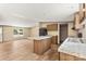 Bright kitchen featuring an island, plenty of cabinet space, and stainless steel appliances at 143 Lakewind Dr, Mooresville, NC 28115