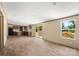 Well-lit living space connects to a bright kitchen and deck with lots of natural light at 143 Lakewind Dr, Mooresville, NC 28115